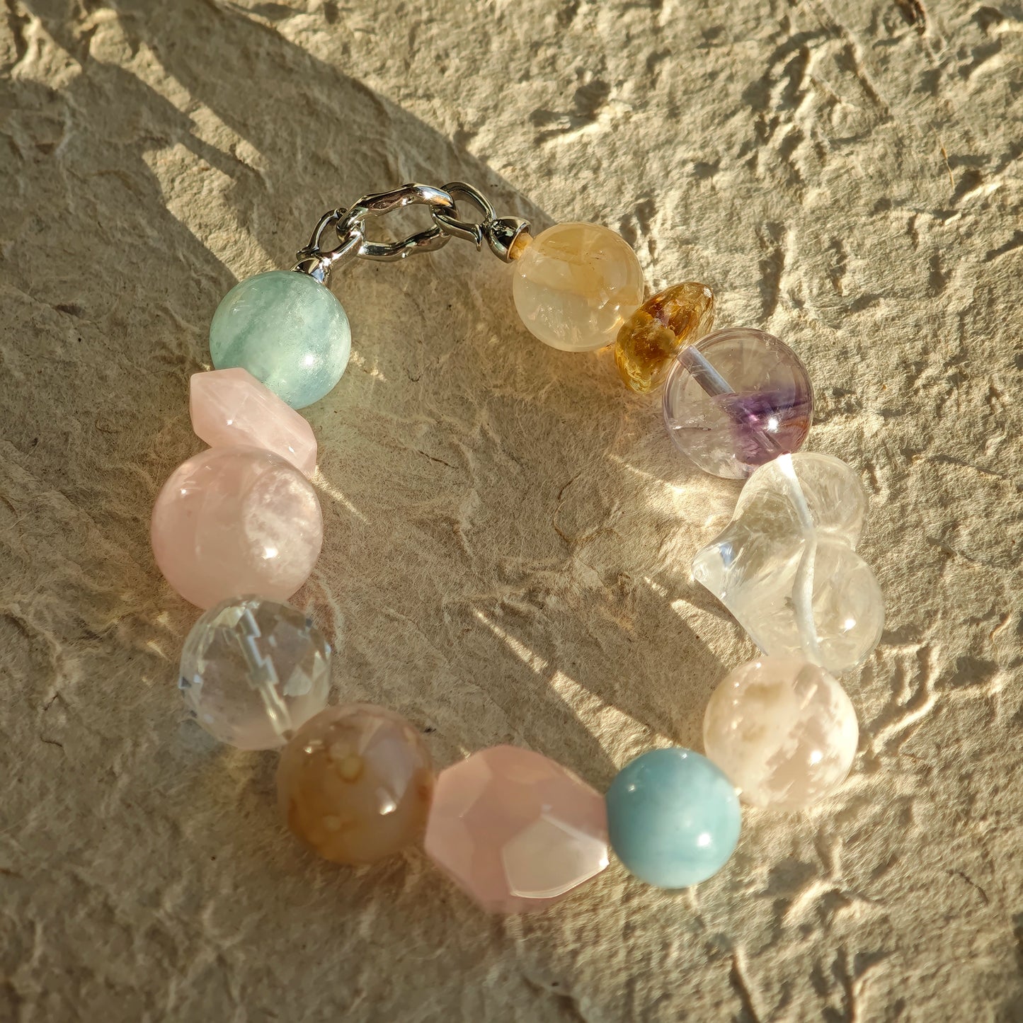 Soft mint, cotton-candy pink, crystal clear, lemon sorbet, and lavender fuse in this crystal bracelet.