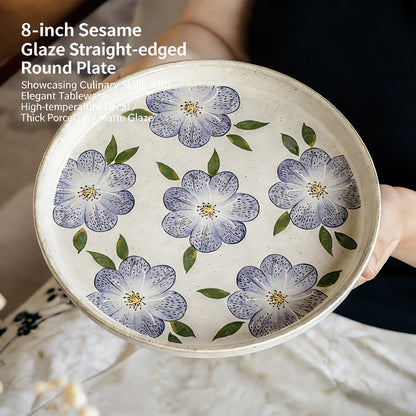This is an 8-inch ceramic plate with straight-edged round shape. In the surface of the plate, there are sesame glaze and vintage clematis patterns.