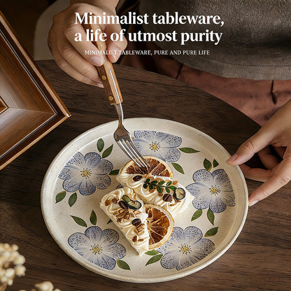 This is an 8-inch ceramic plate with straight-edged round shape. In the surface of the plate, there are sesame glaze and vintage clematis patterns.