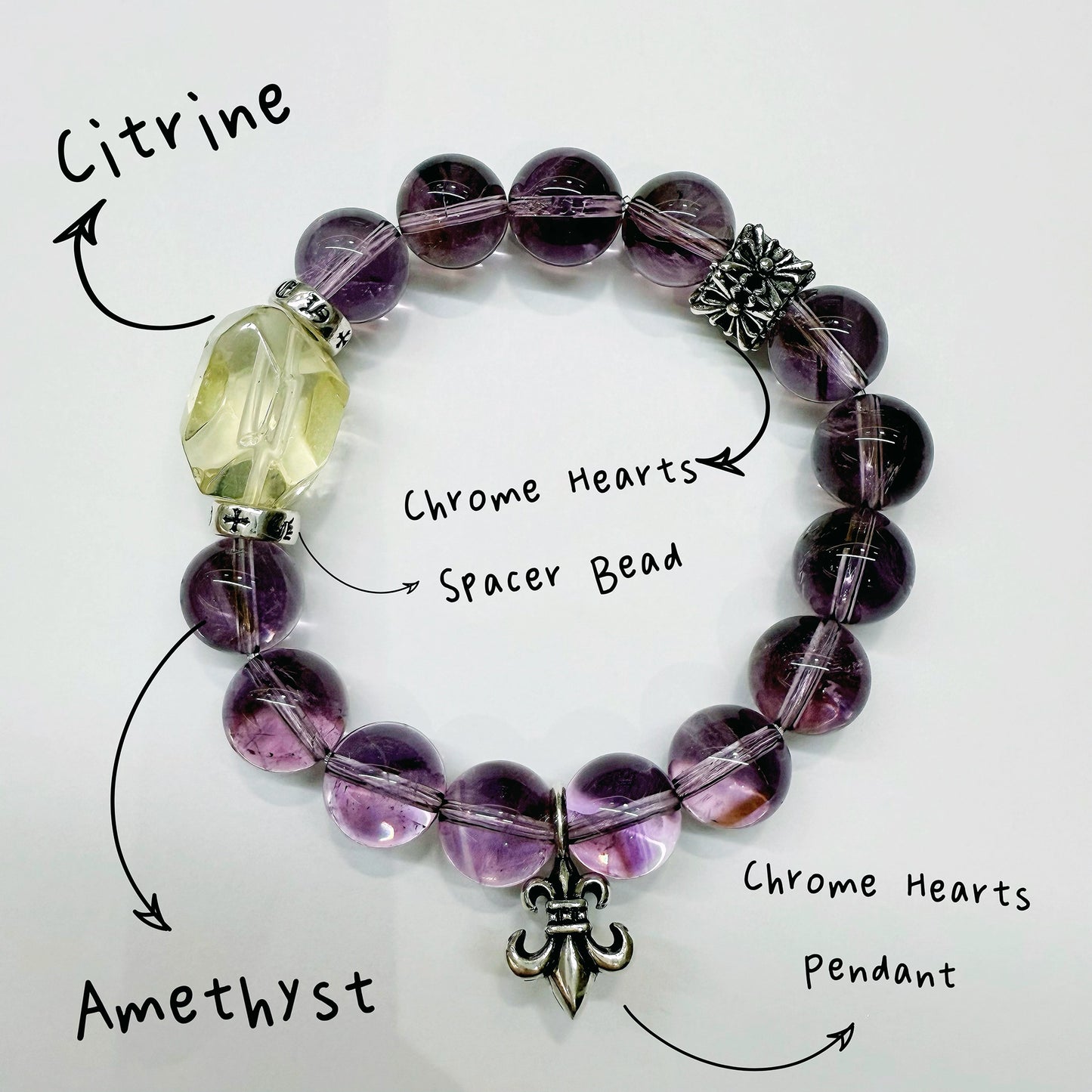 This is a crystal bracelet that consists of amethyst, citrine and chrome hearts spacers.