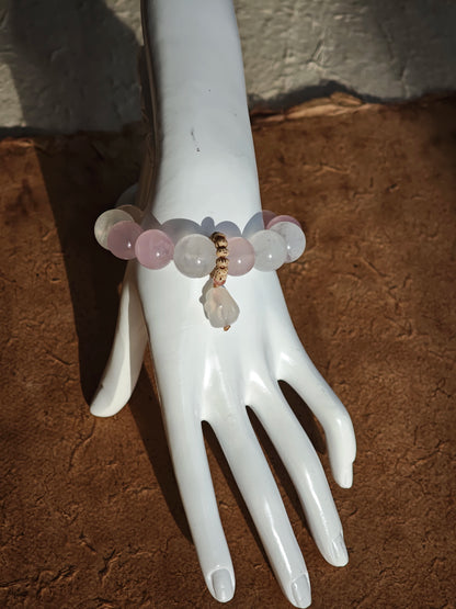 Wrapped around you: Rose Quartz love, White Phantom Quartz clarity, and an agate rabbit guardian.
