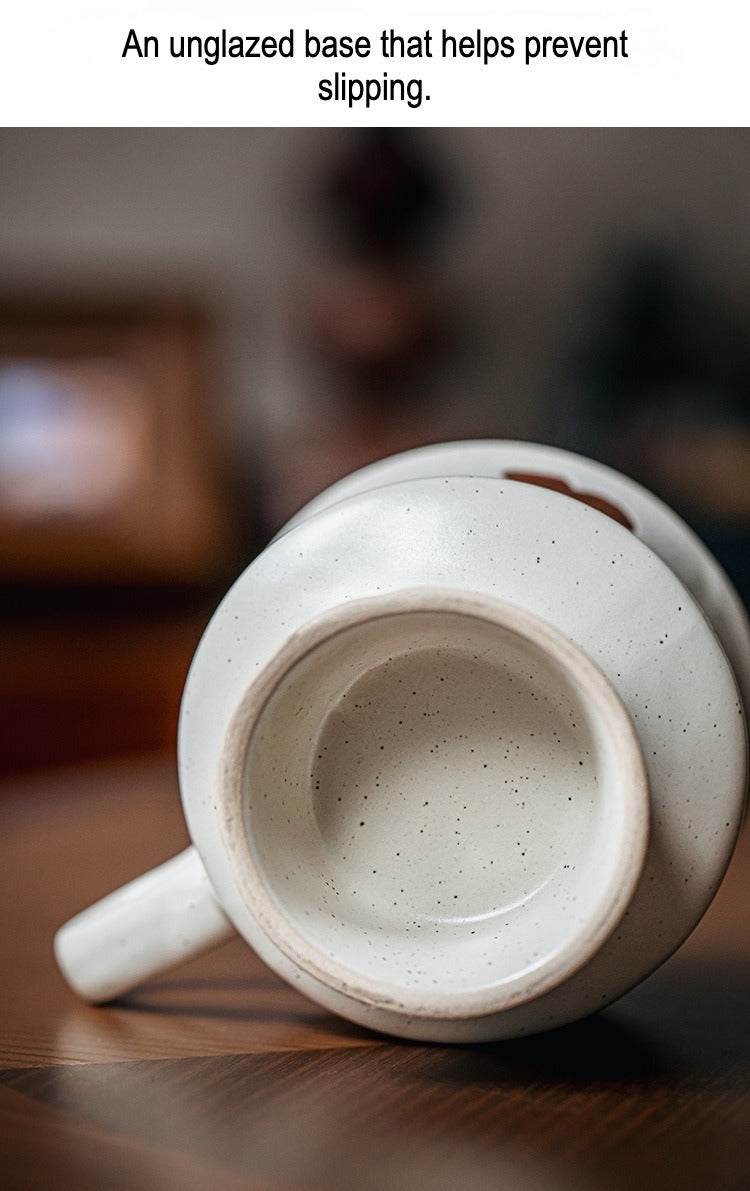 This is a 300ml ceramic goblet mug with hand-painted leaf or flower patterns and a matte sesame-speckled glaze design. With mouth diameter of 9.7, bottom diameter of 6.7cm and height of 10.5cm, this mug is ideal for coffee, milk, water, or oatmeal during slow mornings or quiet afternoons.