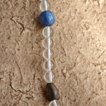 A multi-gemstone bracelet which is made with Silver Sheen Obsidian, Clear Quartz, Amethyst, Rose Quartz, Kyanite, Citrine, and Prehnite, etc. It’s also a necklace.