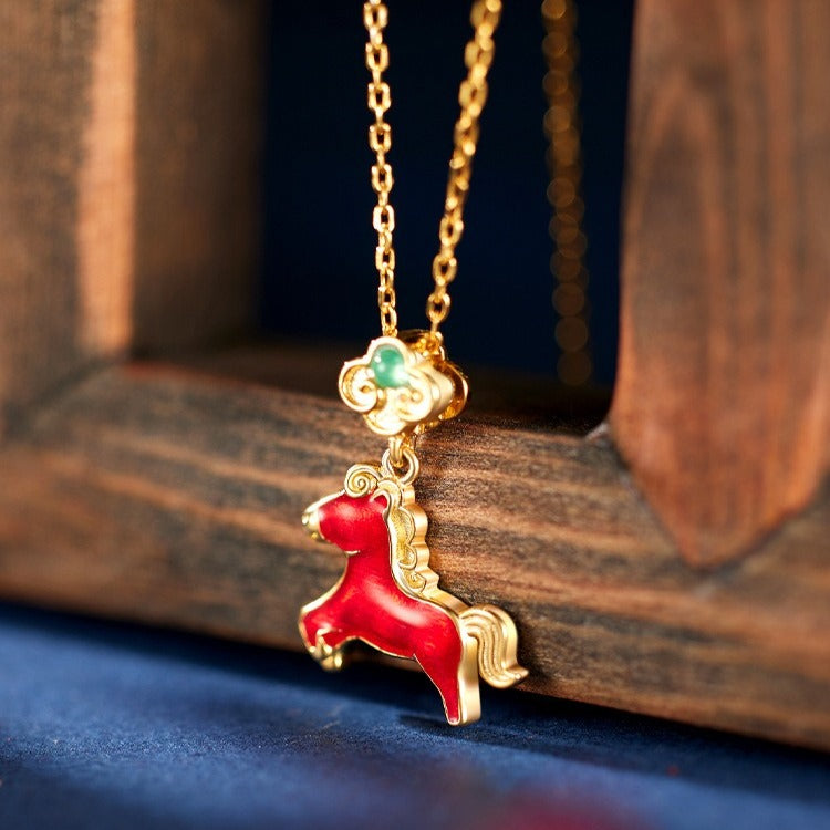 This is a S925 sterling silver necklace with horse pendant. The necklace is with gold color and the horse pendent is in red color. It's a delicate clavicle chain which can match many different outfits.