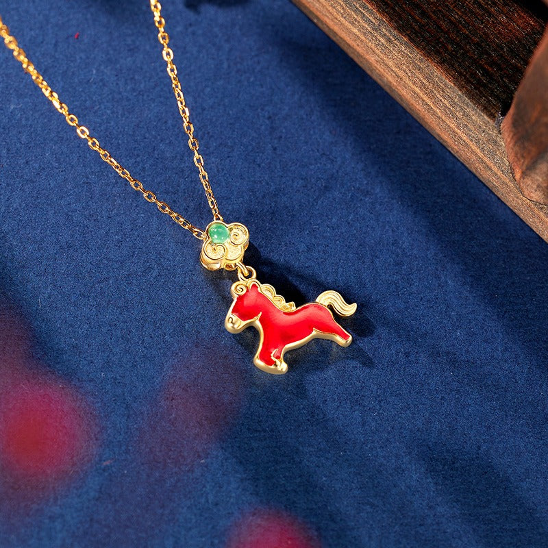 This is a S925 sterling silver necklace with horse pendant. The necklace is with gold color and the horse pendent is in red color. It's a delicate clavicle chain which can match many different outfits.