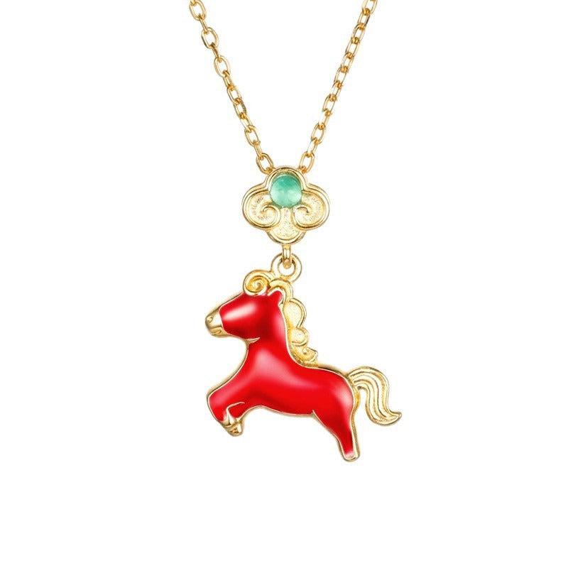 This is a S925 sterling silver necklace with horse pendant. The necklace is with gold color and the horse pendent is in red color. It's a delicate clavicle chain which can match many different outfits.