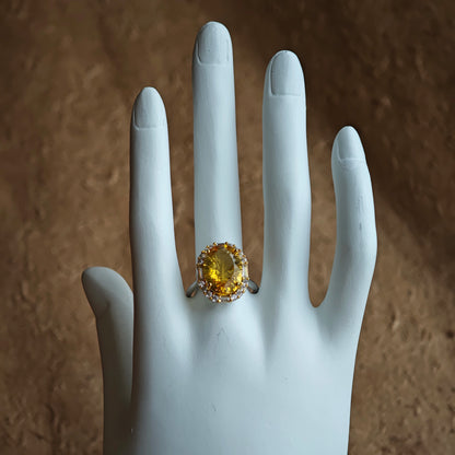 One hundred twenty-eight angled mirrors turn this 7 ct honey-colored stone into a portable lighthouse.