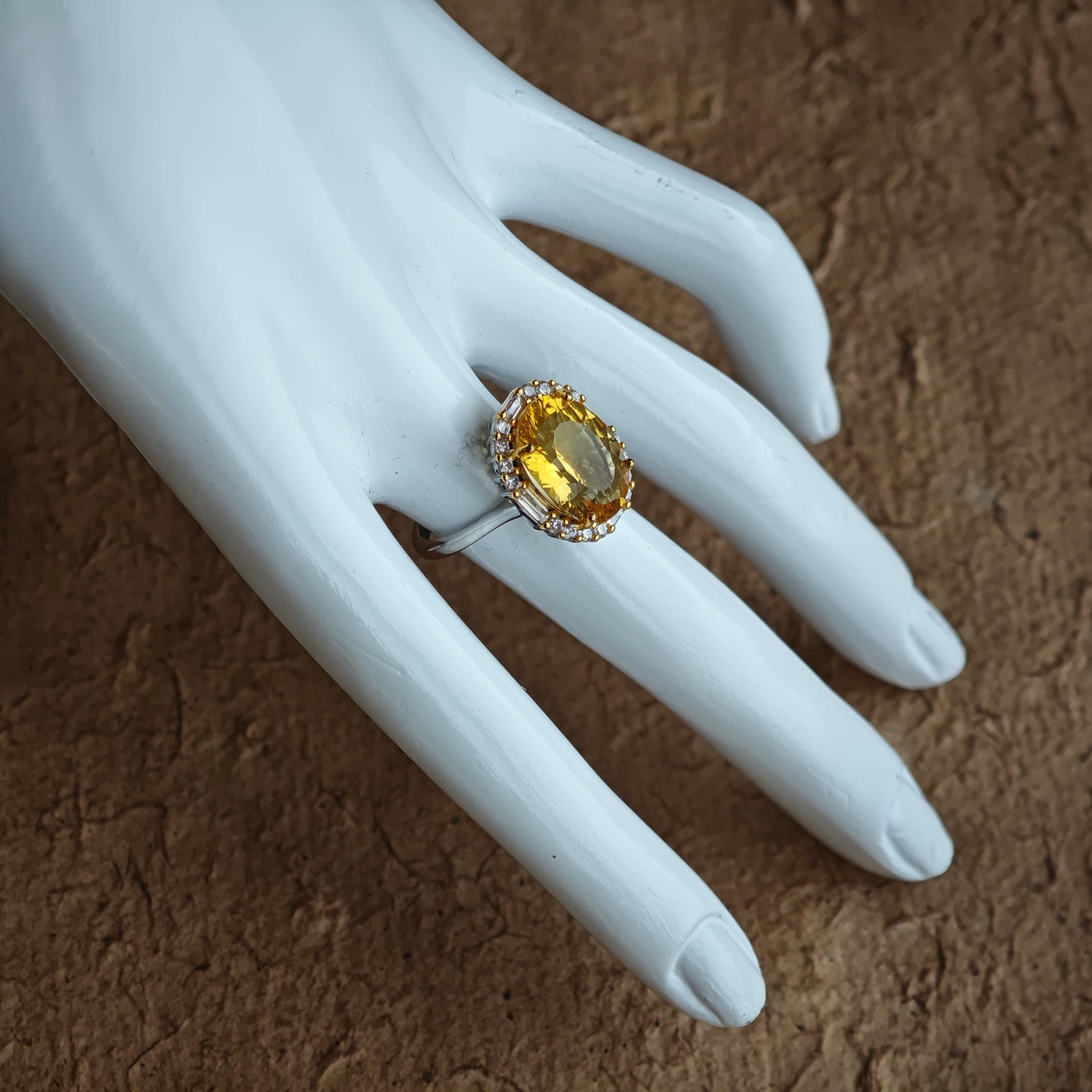 A 7-carat golden drop, sliced 128 ways, becomes a living disco ball for your finger.