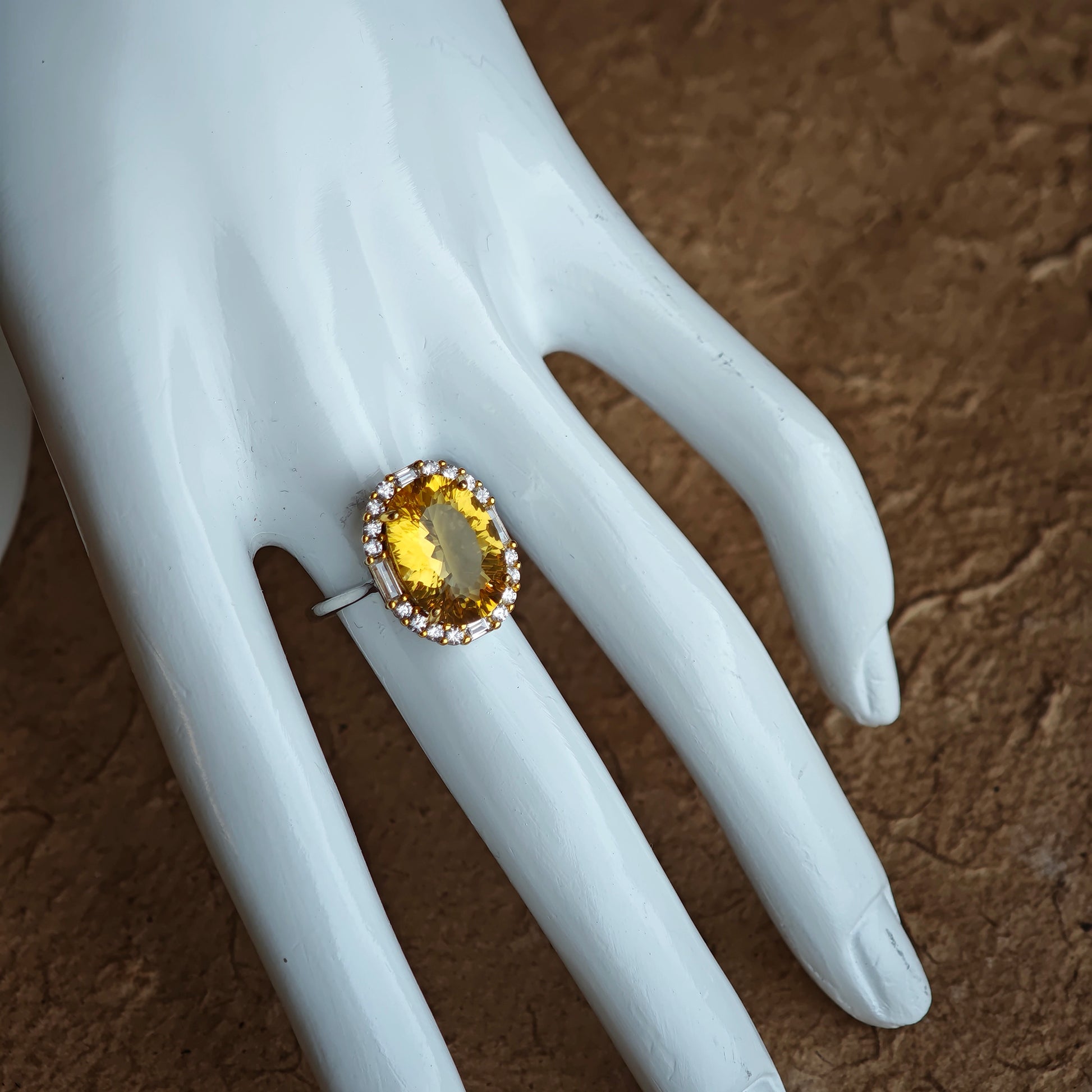 The citrine’s 128 facets are secret doorways; open them with a twist of the wrist and light floods out.