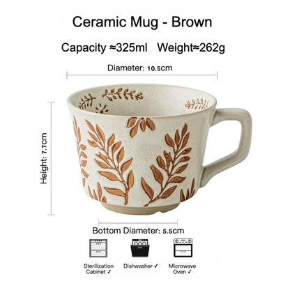 This is a 325ml coarse ceramic mug with a matte sesame-speckled glaze and hand-painted leaf design. It comes with a rounded handle that sits comfortably in your hand. Ideal for coffee, milk, water, or oatmeal during slow mornings or quiet afternoons.