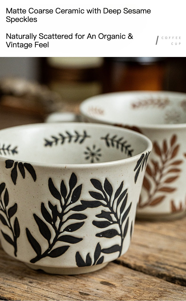 This is a 325ml coarse ceramic mug with a matte sesame-speckled glaze and hand-painted leaf design. It comes with a rounded handle that sits comfortably in your hand. Ideal for coffee, milk, water, or oatmeal during slow mornings or quiet afternoons.