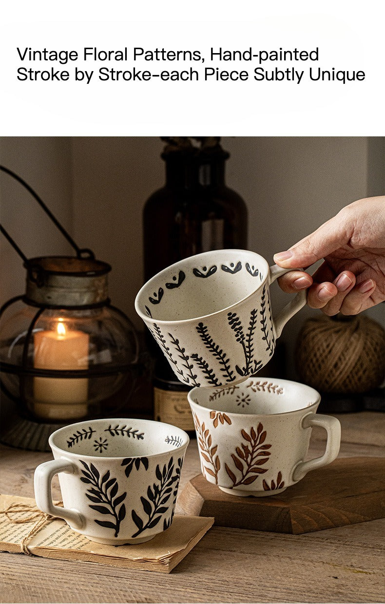 This is a 325ml coarse ceramic mug with a matte sesame-speckled glaze and hand-painted leaf design. It comes with a rounded handle that sits comfortably in your hand. Ideal for coffee, milk, water, or oatmeal during slow mornings or quiet afternoons.