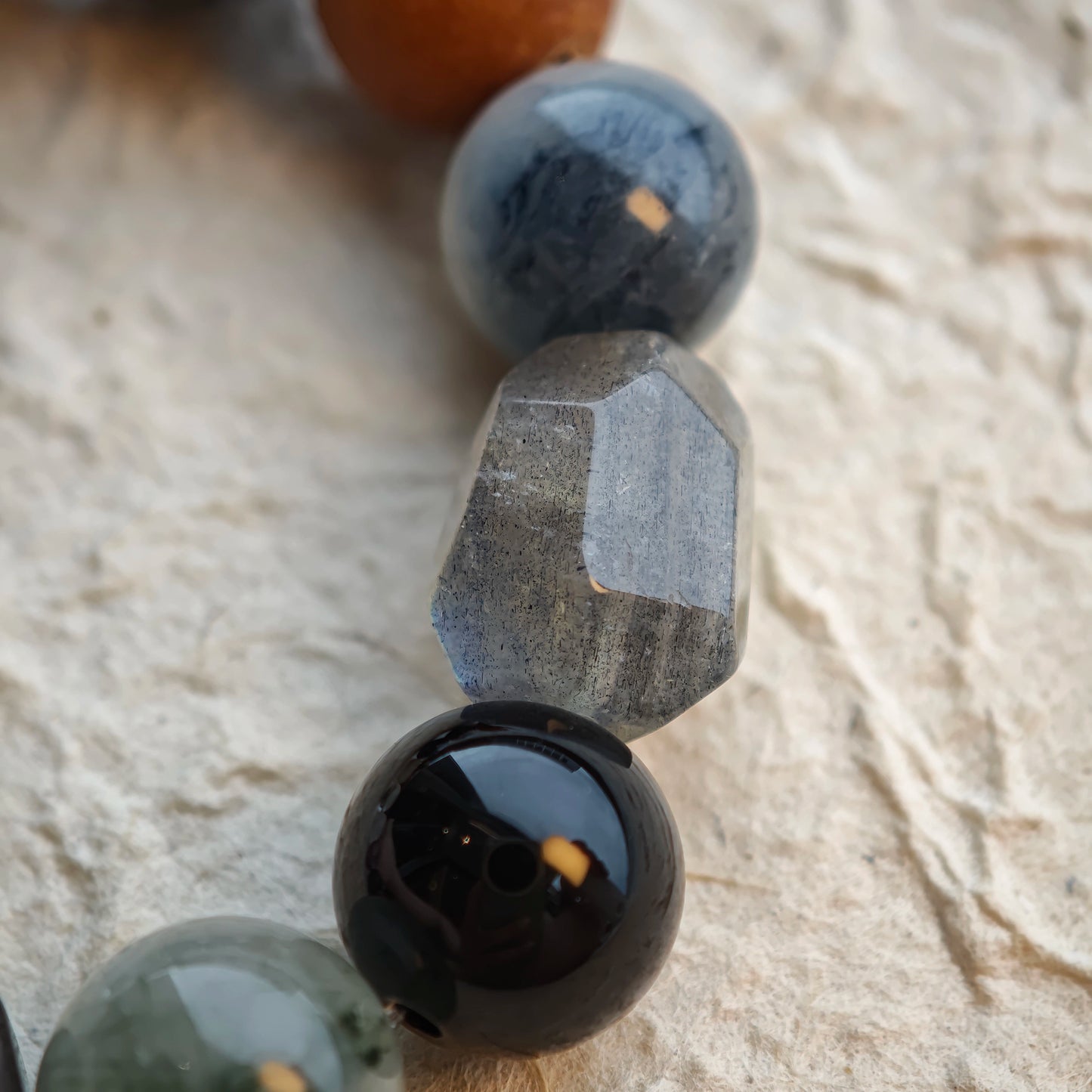 These six stones weave silver, violet, lemon and moon-glow into a versatile, mysterious bracelet.