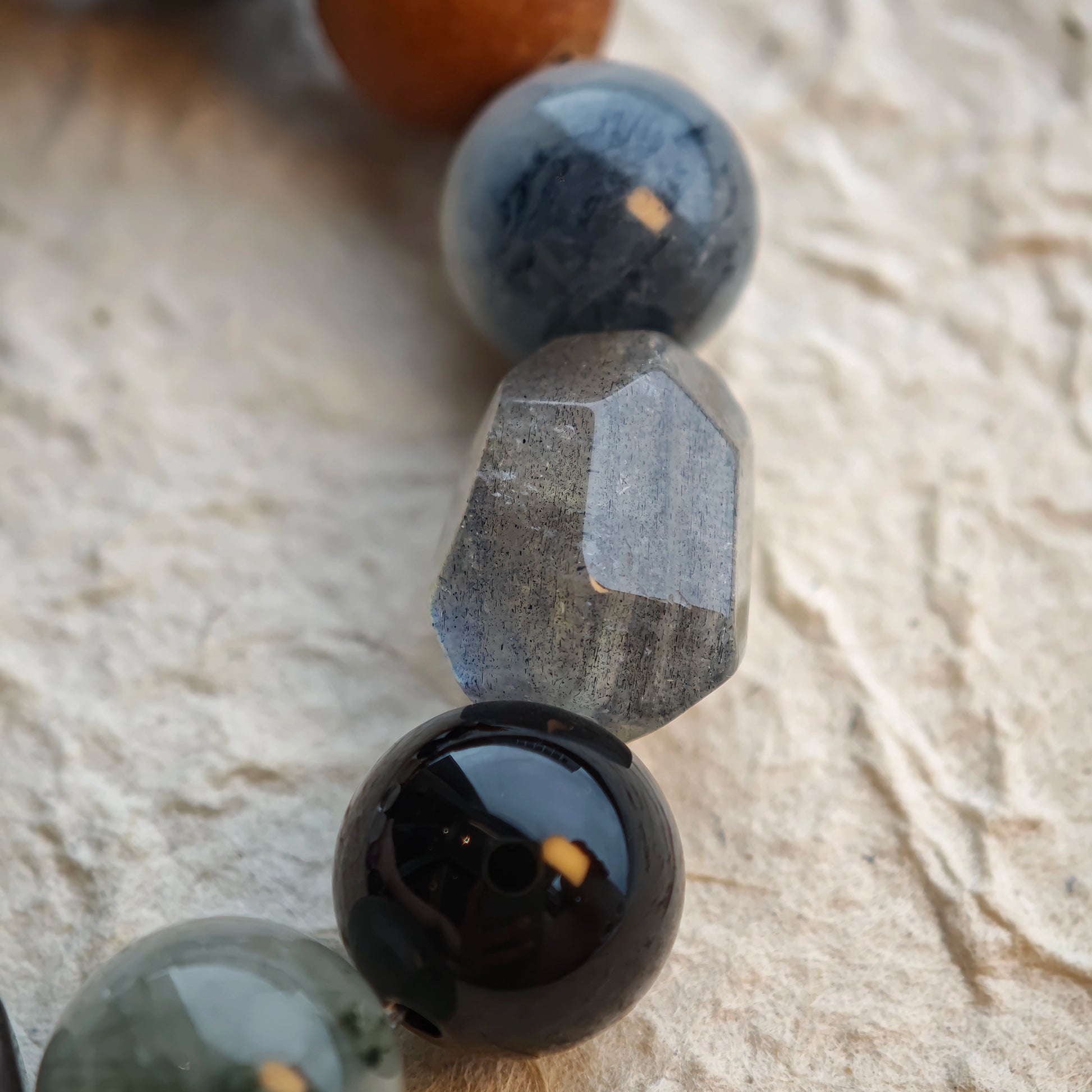 These six stones weave silver, violet, lemon and moon-glow into a versatile, mysterious bracelet.