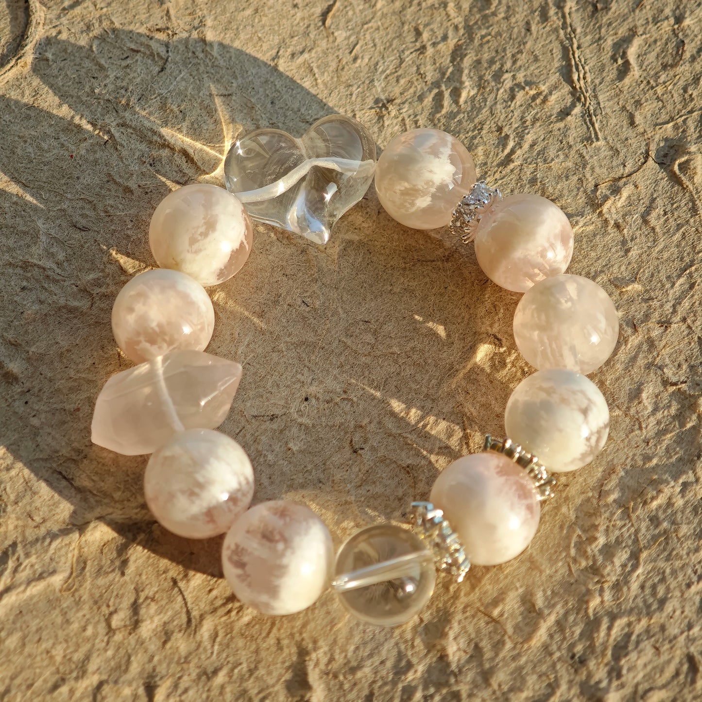 Phantom rose quartz meets clear quartz—one gentle, one pure—calling your hidden dreams awake.