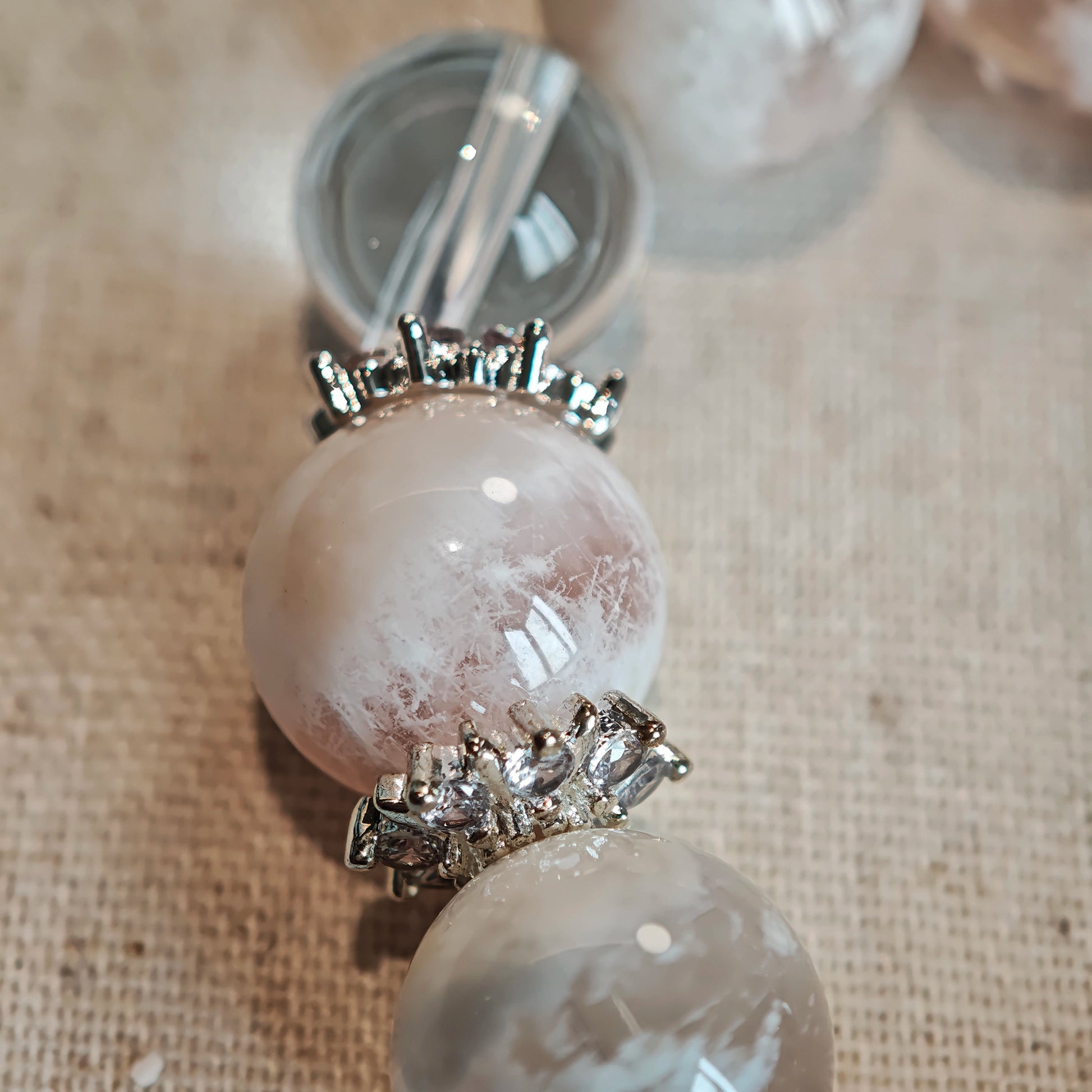 Snow-soft pinks and glass-clear whites hold hands, inviting buried longings to surface.