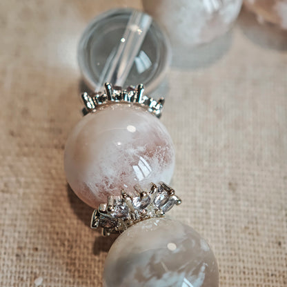 Snow-soft pinks and glass-clear whites hold hands, inviting buried longings to surface.