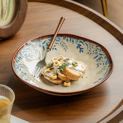 This is a 9-inch/23.5cm deep plate with blue lotus leaf patterns. The capacity is 920ml. And it's with wide and open shape. Crafted using a reactive "Kiln Change" glaze technique, each plate reacts differently to the high heat of the kiln.