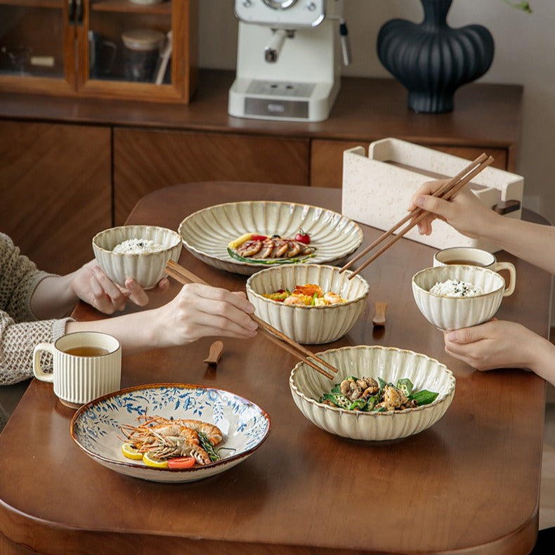 This is a 9-inch/23.5cm deep plate with blue lotus leaf patterns. The capacity is 920ml. And it's with wide and open shape. Crafted using a reactive "Kiln Change" glaze technique, each plate reacts differently to the high heat of the kiln.