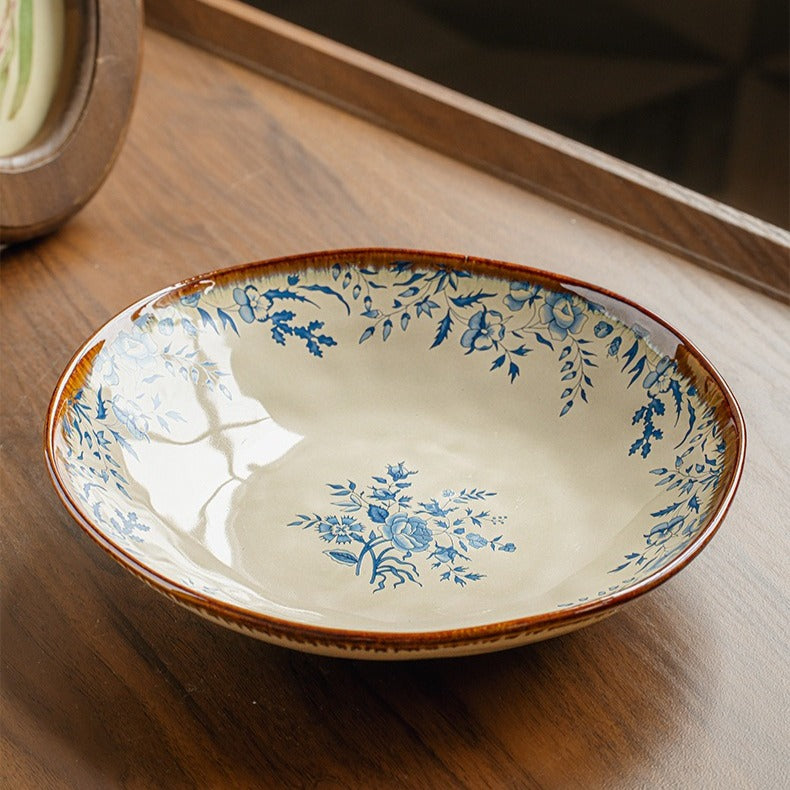 This is a 9-inch/23.5cm deep plate with blue lotus leaf patterns. The capacity is 920ml. And it's with wide and open shape. Crafted using a reactive "Kiln Change" glaze technique, each plate reacts differently to the high heat of the kiln.