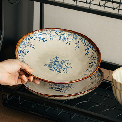 This is a 9-inch/23.5cm deep plate with blue lotus leaf patterns. The capacity is 920ml. And it's with wide and open shape. Crafted using a reactive "Kiln Change" glaze technique, each plate reacts differently to the high heat of the kiln.