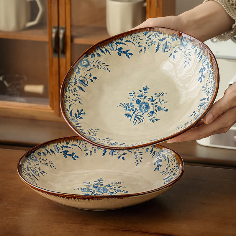 This is a 9-inch/23.5cm deep plate with blue lotus leaf patterns. The capacity is 920ml. And it's with wide and open shape. Crafted using a reactive "Kiln Change" glaze technique, each plate reacts differently to the high heat of the kiln.