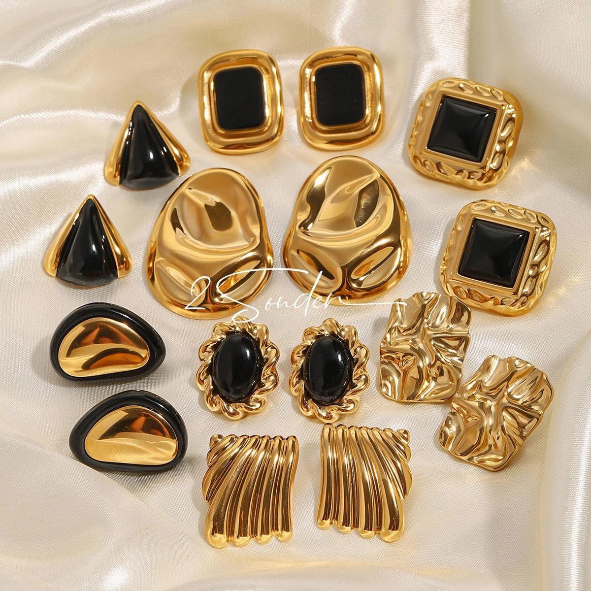 Classic Black and Gold Stud Earrings with Geometric Shape.
