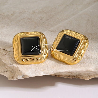 Classic Black and Gold Stud Earrings with Geometric Shape.