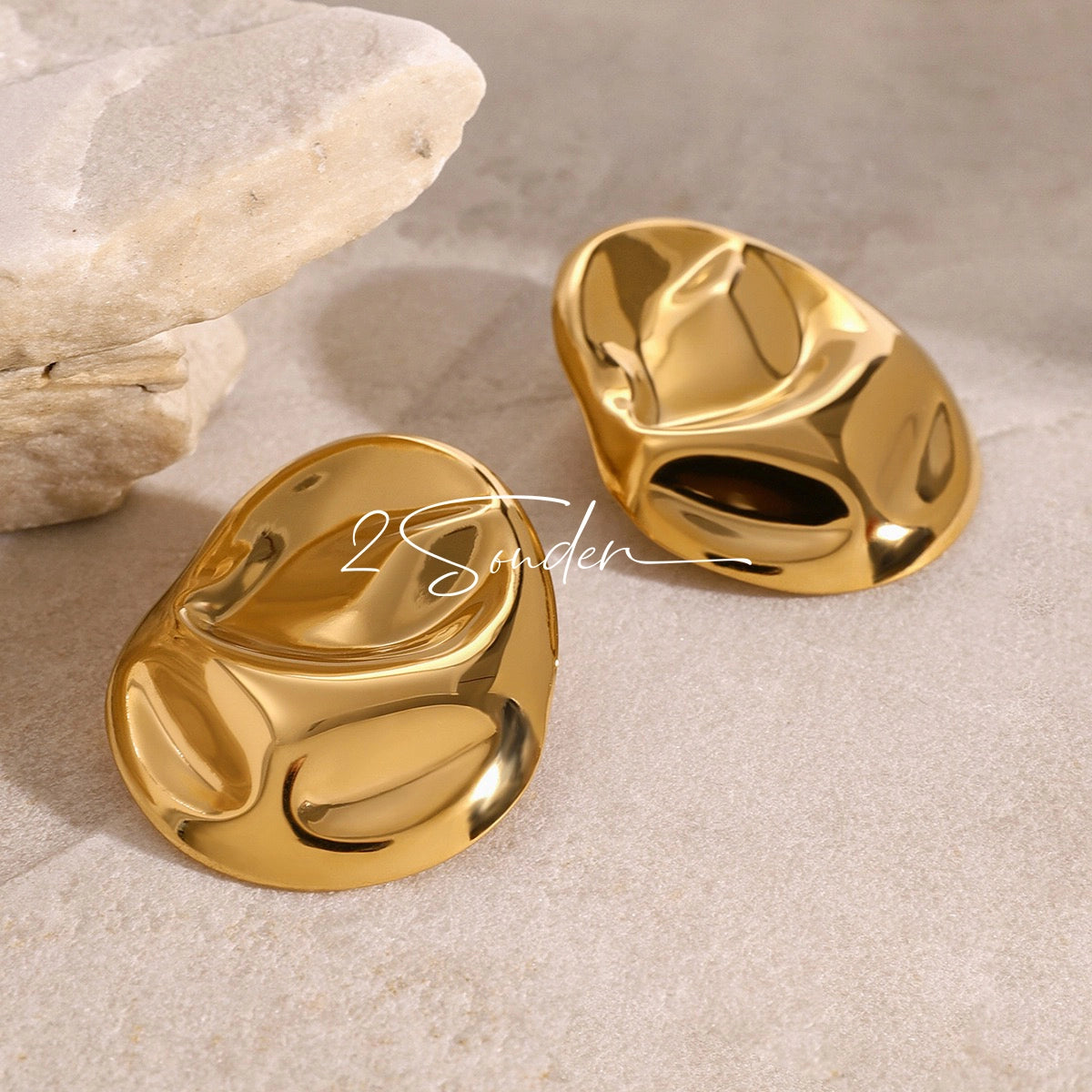 Classic Black and Gold Stud Earrings with Geometric Shape.