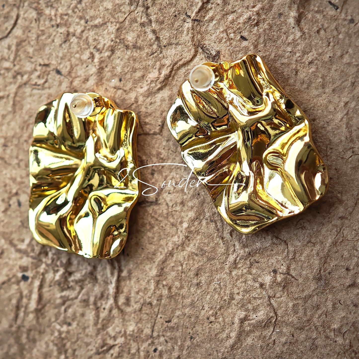 Classic Black and Gold Stud Earrings with Geometric Shape.