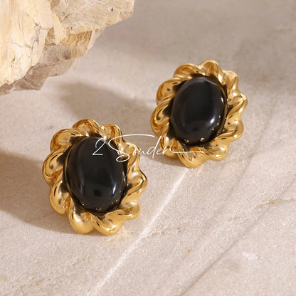 Classic Black and Gold Stud Earrings with Geometric Shape.