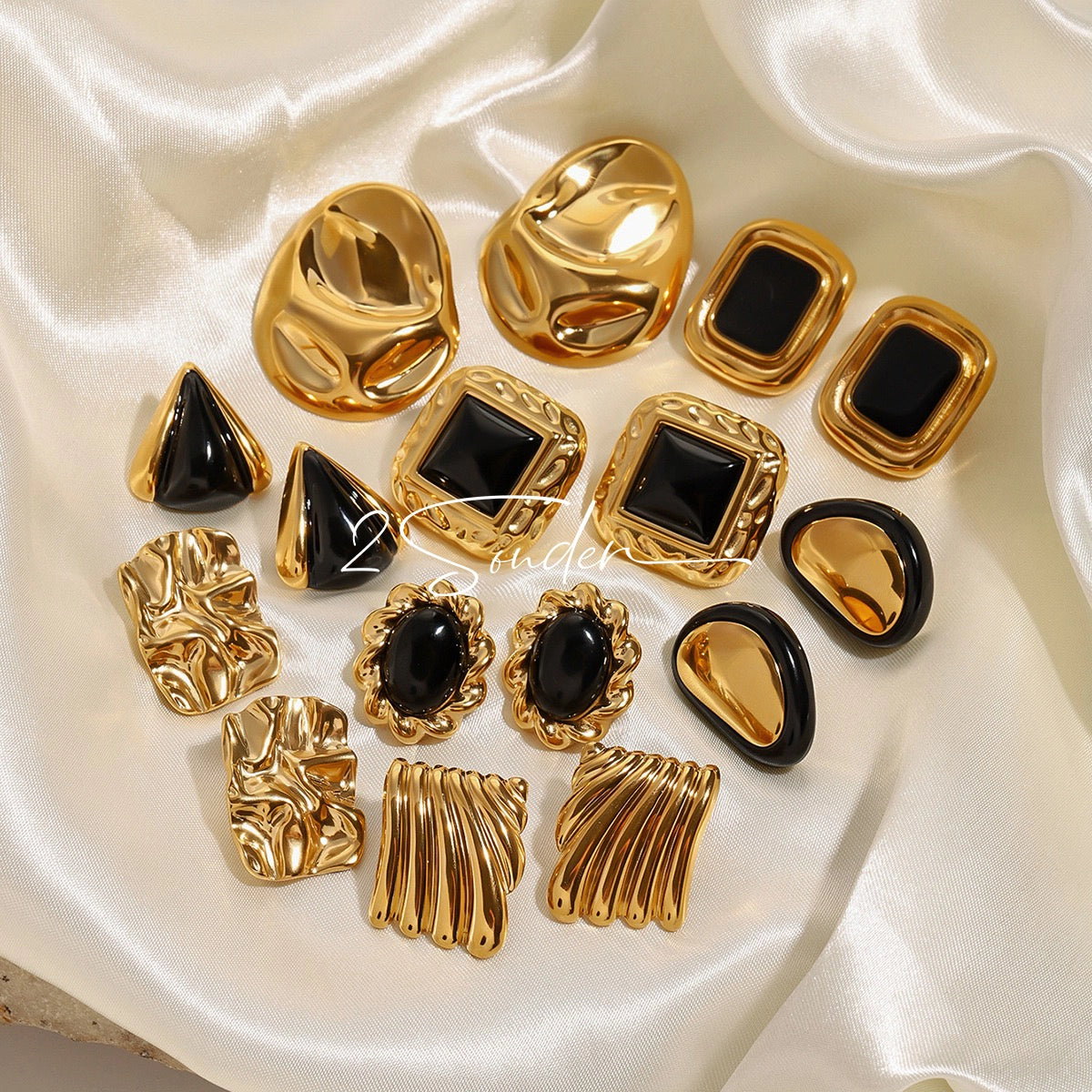 Classic Black and Gold Stud Earrings with Geometric Shape.