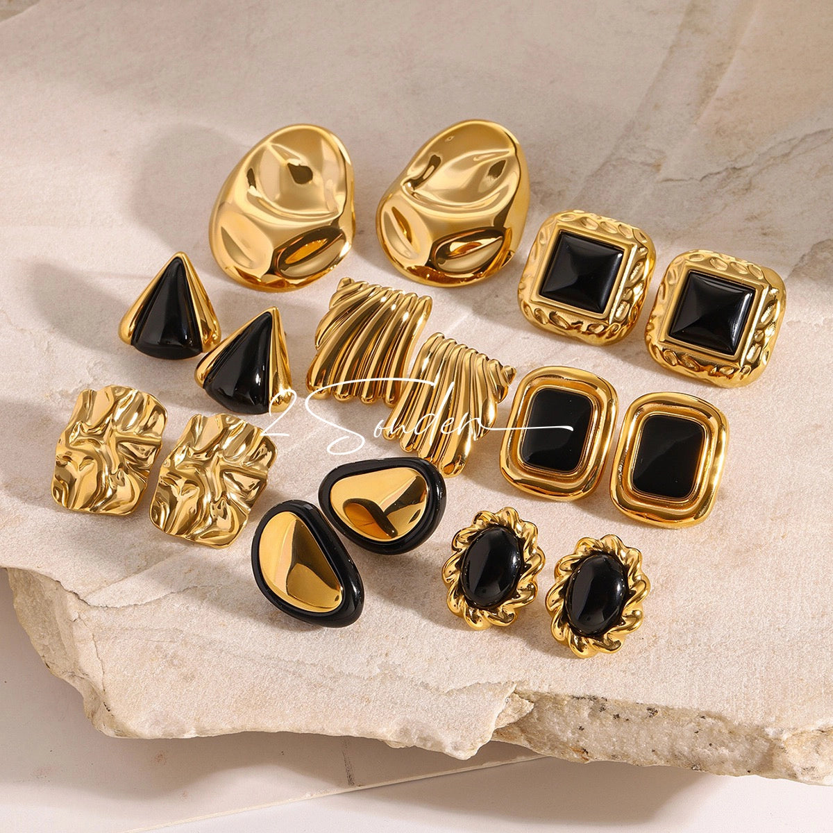 Classic Black and Gold Stud Earrings with Geometric Shape.