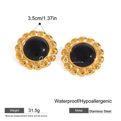 Classic Black and Gold Stud Earrings with Geometric Shape.