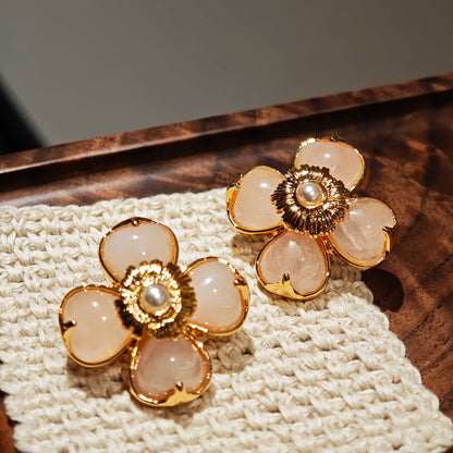 This is a pair of pink earrings made of recycled copper and ethically sourced natural stones. The size of each piece of earring is 3.7x3.7cm.