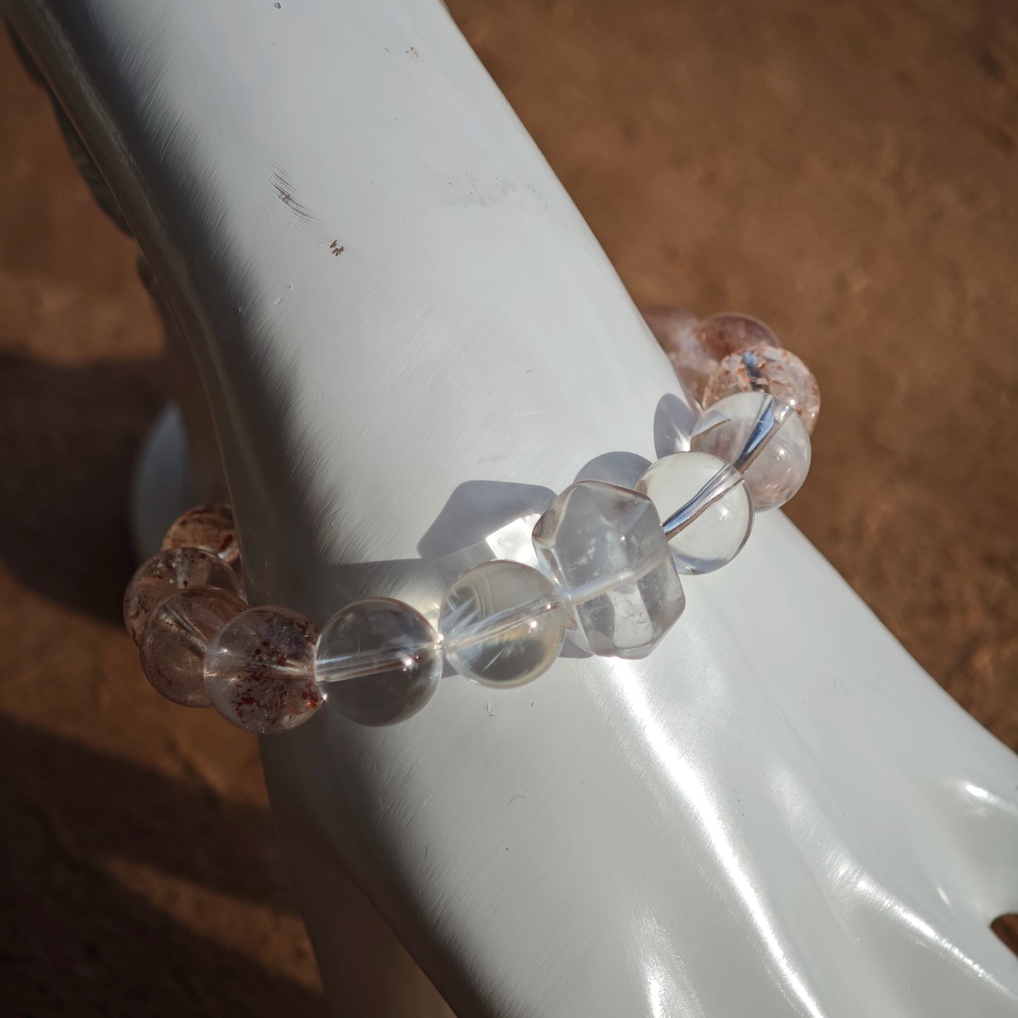This is a golden strawberry quartz and Clear Quartz bracelet, with unique transparency and elegance.