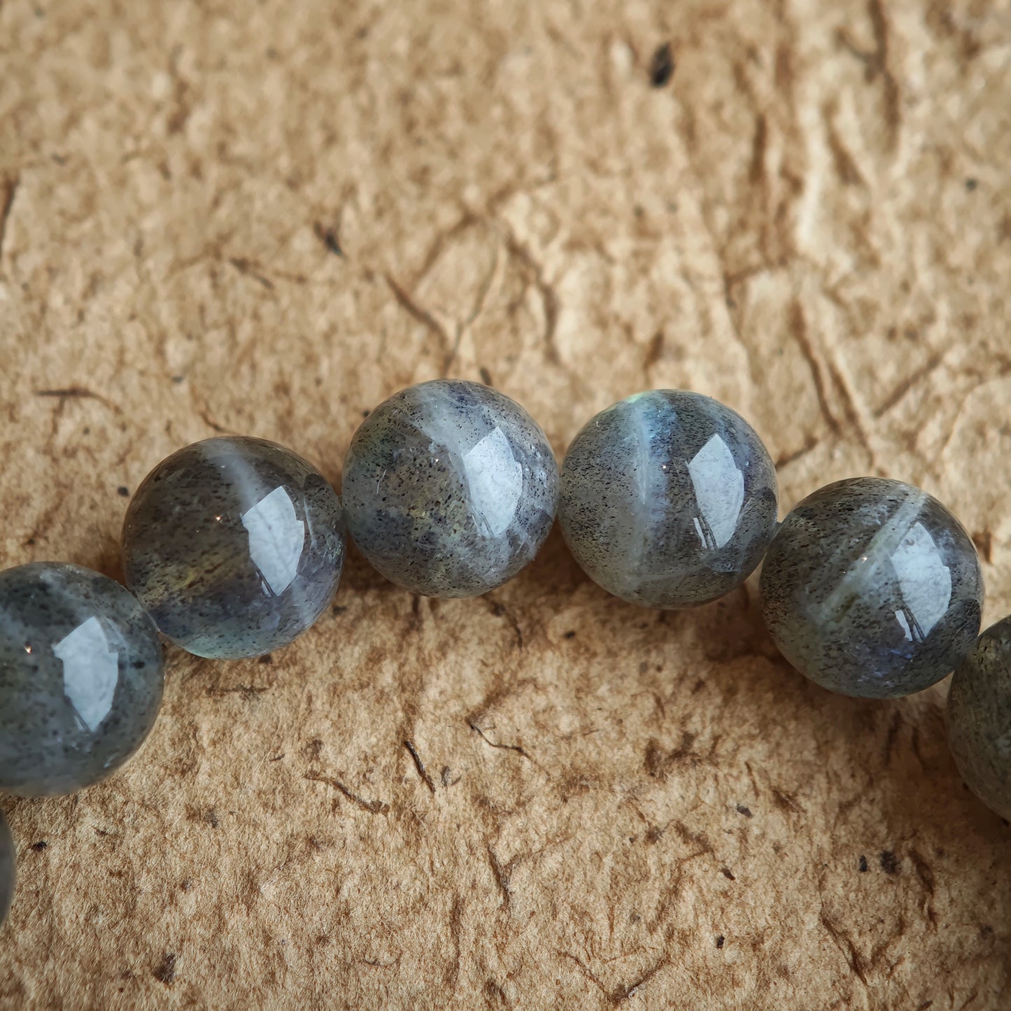 This grey moonstone bracelet consists of 17 grey moonstone and 1 clear quartz. It's mystery and elegant.