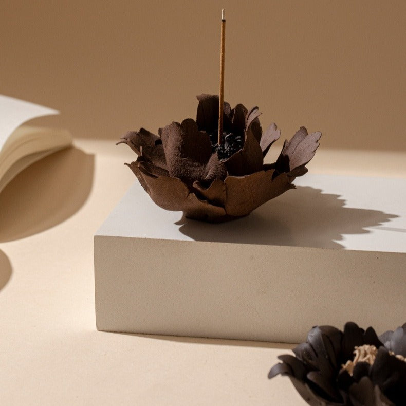 This is a ceramic flower incense stick holder with a lifelike flower. Each ceramic flower is individually hand-shaped using traditional ceramic craftsmanship. The ceramic flower is with diameter of 8cm and height of 4.3cm.