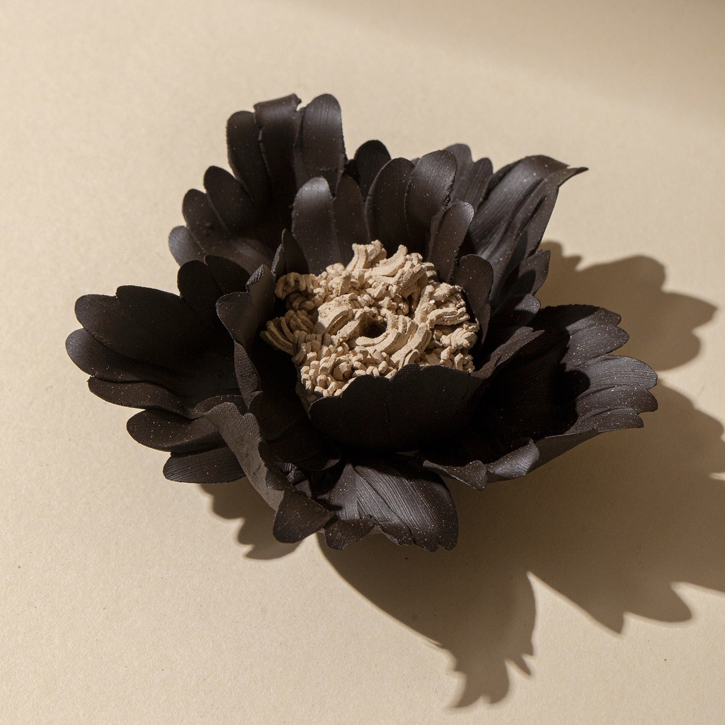 This is a ceramic flower incense stick holder with a lifelike flower. Each ceramic flower is individually hand-shaped using traditional ceramic craftsmanship. The ceramic flower is with diameter of 8cm and height of 4.3cm.