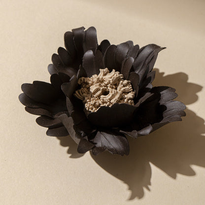 This is a ceramic flower incense stick holder with a lifelike flower. Each ceramic flower is individually hand-shaped using traditional ceramic craftsmanship. The ceramic flower is with diameter of 8cm and height of 4.3cm.