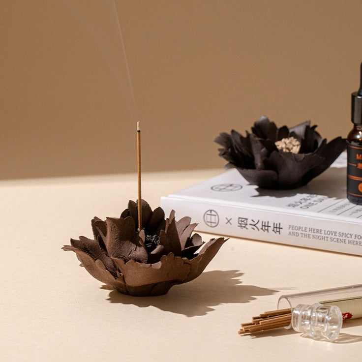 This is a ceramic flower incense stick holder with a lifelike flower. Each ceramic flower is individually hand-shaped using traditional ceramic craftsmanship. The ceramic flower is with diameter of 8cm and height of 4.3cm.