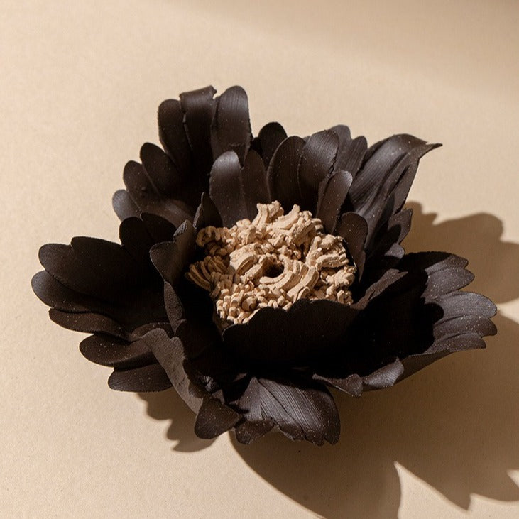 This is a ceramic flower incense stick holder with a lifelike flower. Each ceramic flower is individually hand-shaped using traditional ceramic craftsmanship. The ceramic flower is with diameter of 8cm and height of 4.3cm.