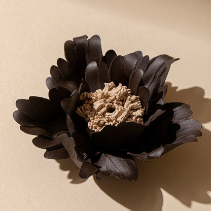 This is a ceramic flower incense stick holder with a lifelike flower. Each ceramic flower is individually hand-shaped using traditional ceramic craftsmanship. The ceramic flower is with diameter of 8cm and height of 4.3cm.