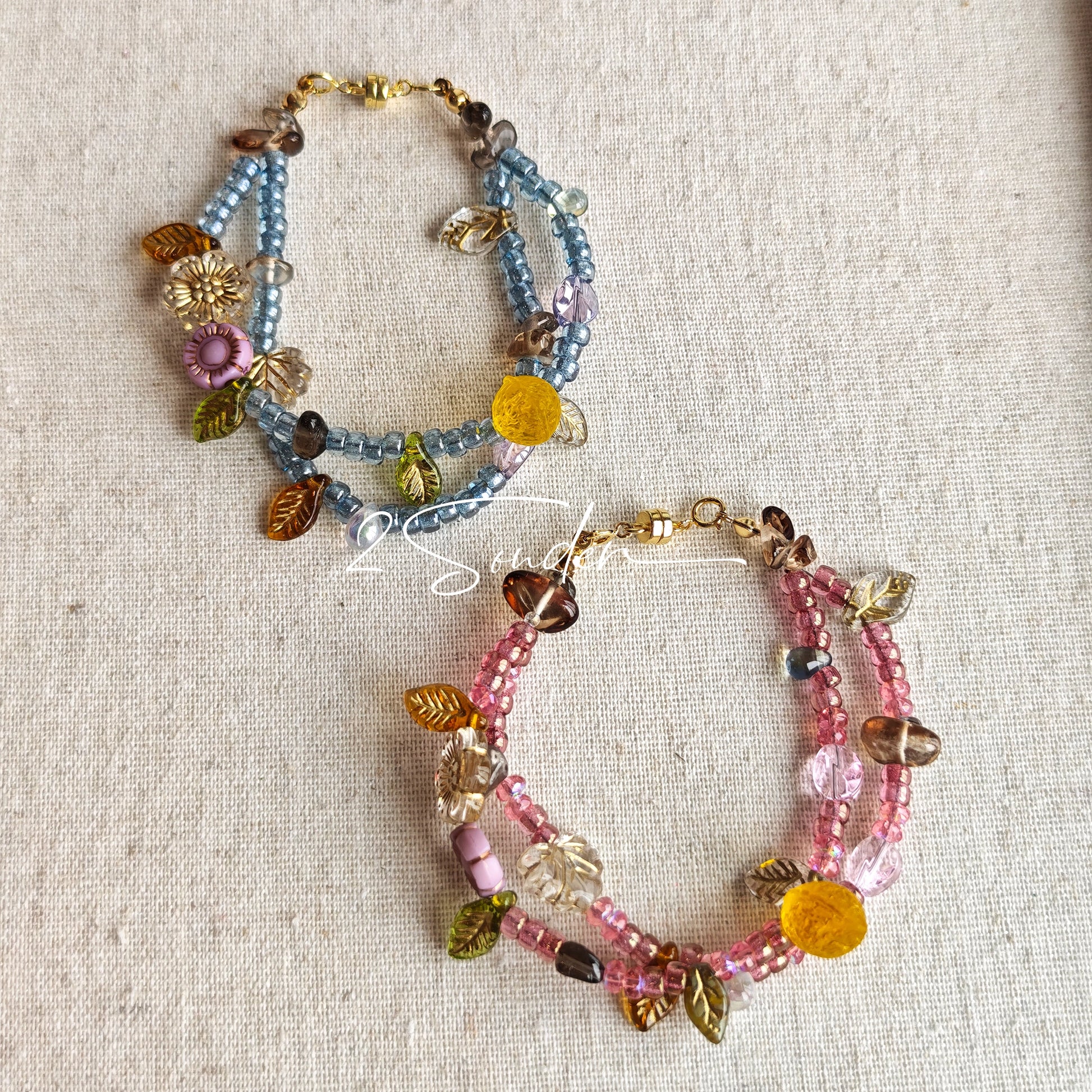 This bracelet features shimmering Czech glass beads in beautiful shades of blue, all hand-strung on a delicate double chain. An 18k gold-plated magnetic clasp makes it super easy to wear, and it's designed for a 15cm wrist.