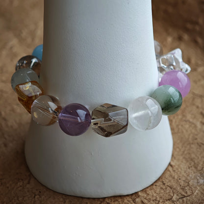 Big, smooth beads carry ocean serenity, royal insight, golden optimism, green healing, and cloudy wisdom.