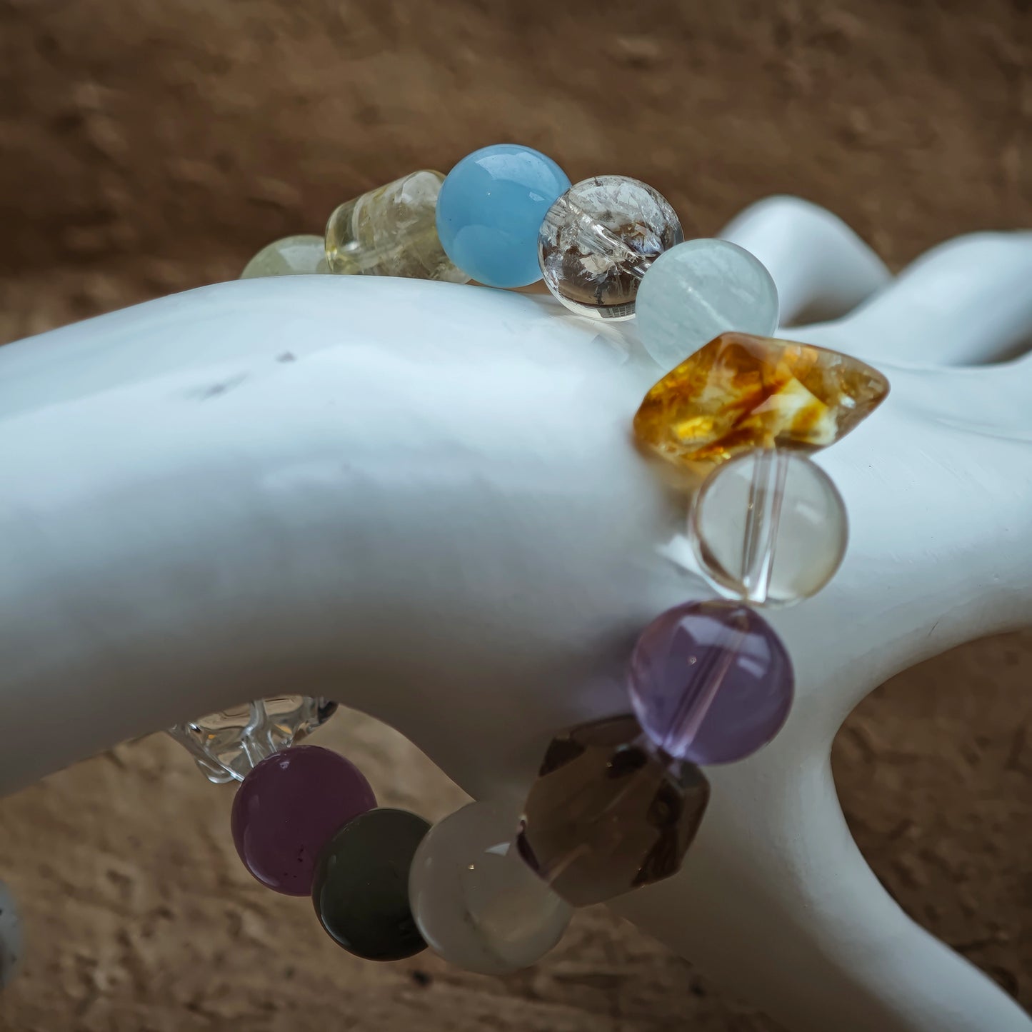 Cool aquamarine meets regal amethyst, sunny citrine, gentle prehnite, and dreamy phantom quartz on this bold strand.