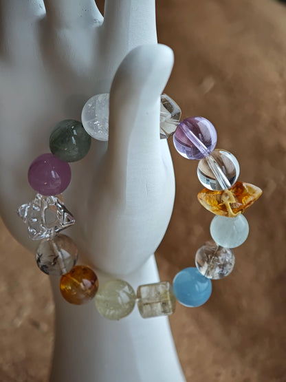 Harmony Treasures unites sky, spirit, sun, earth, and air in 13 mm crystal harmony.