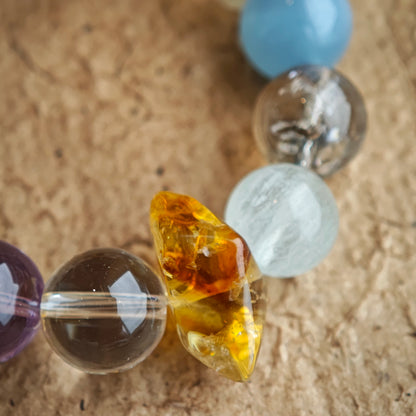 13mm beads of aquamarine, amethyst, citrine, prehnite, and phantom quartz whisper a cool, balanced lullaby.