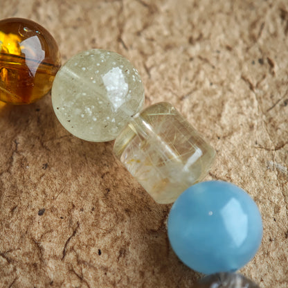 Soft sea tones, noble purples, warm golds, tender greens, and airy whites flow together like silk.