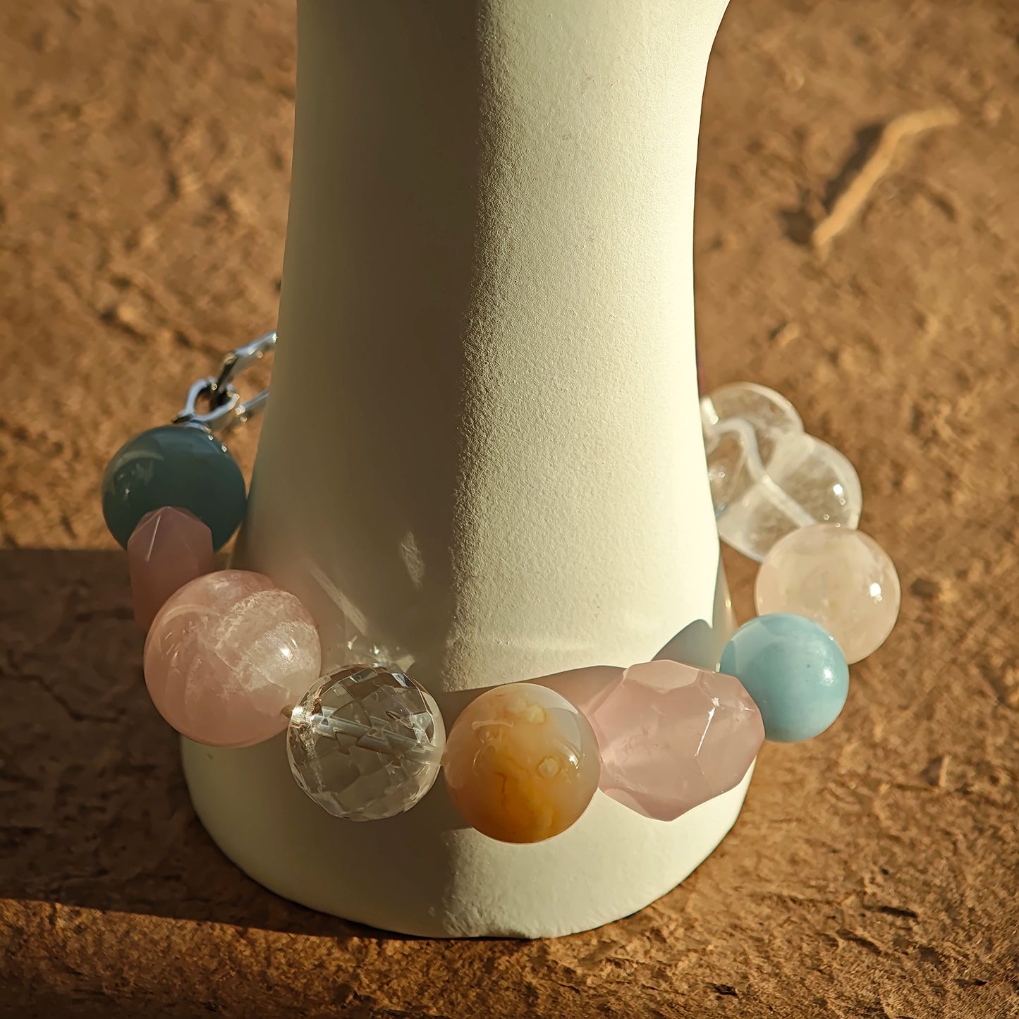 Pastel perfection: aquamarine, rose quartz, clear quartz, citrine, and amethyst in one delicate circle.